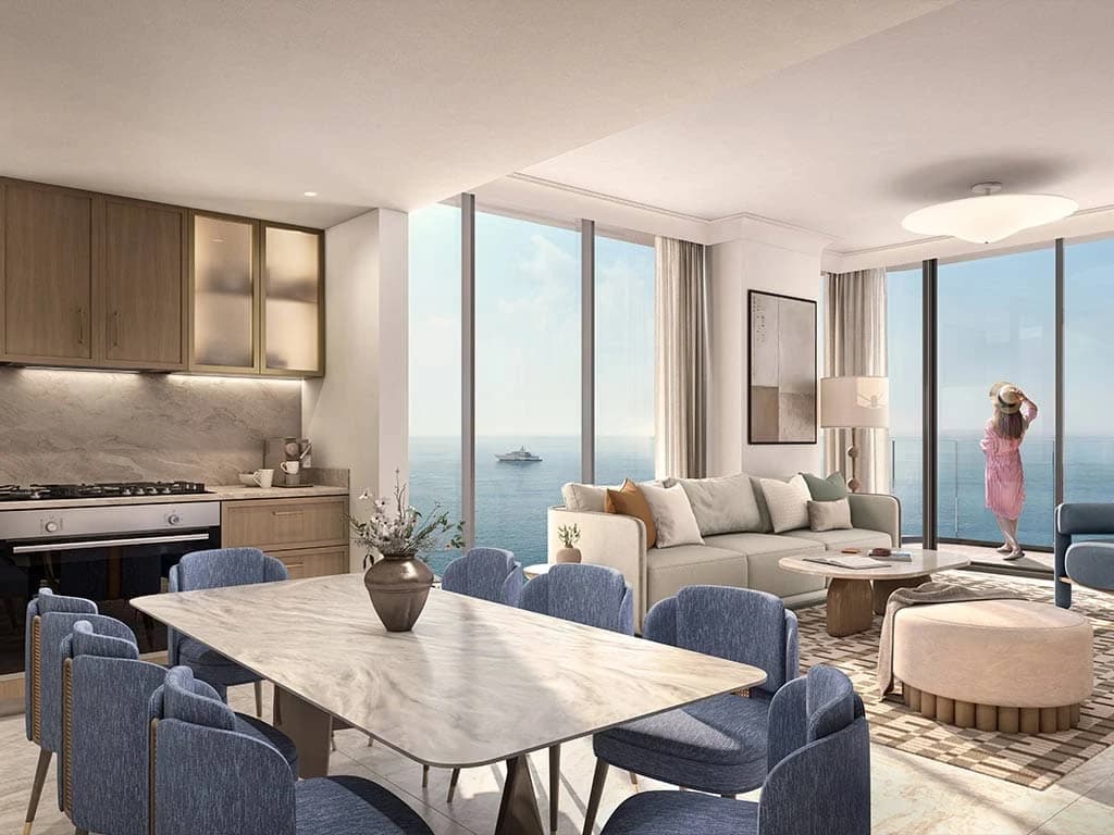Open-plan kitchen, dining and living area with sea views; official developer rendering