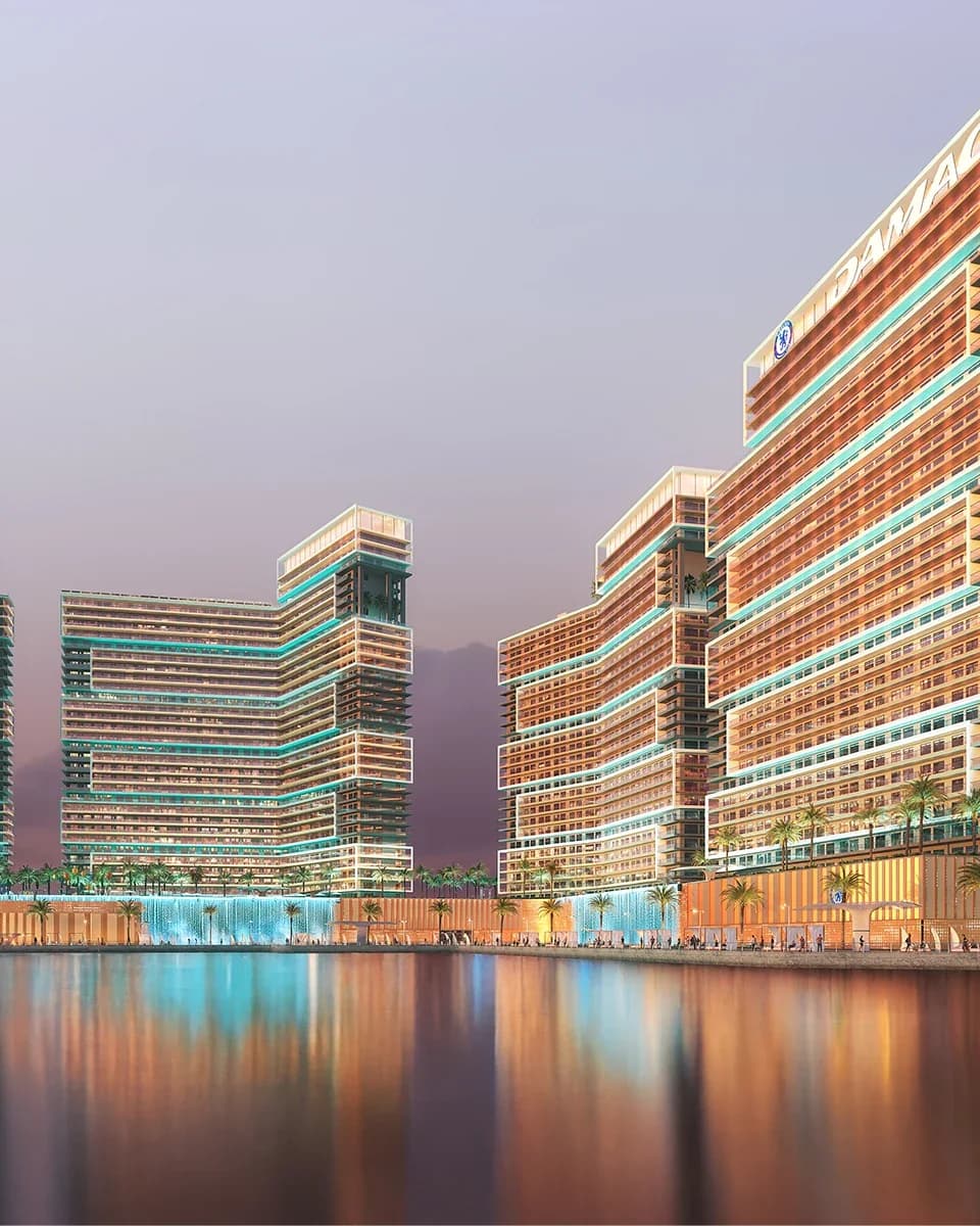 Chelsea Residences: Waterfront towers illuminated at dusk; official developer rendering
