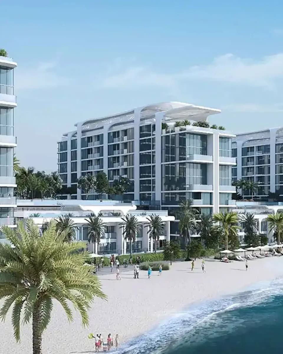 Starline Beach Residences: beachfront residences beside palms and sand — rendering