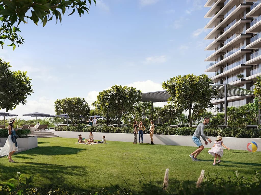 Altan: landscaped lawn beside the residential tower (developer rendering)