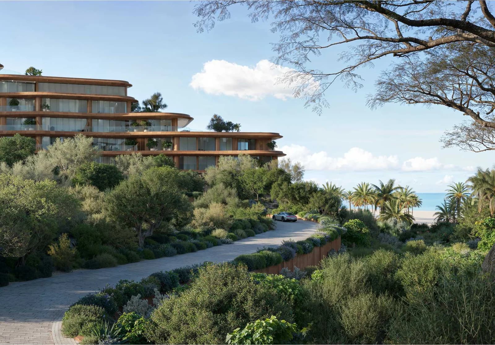 Jumeirah Asora Bay developer rendering: curved residential terraces above a planted arrival road