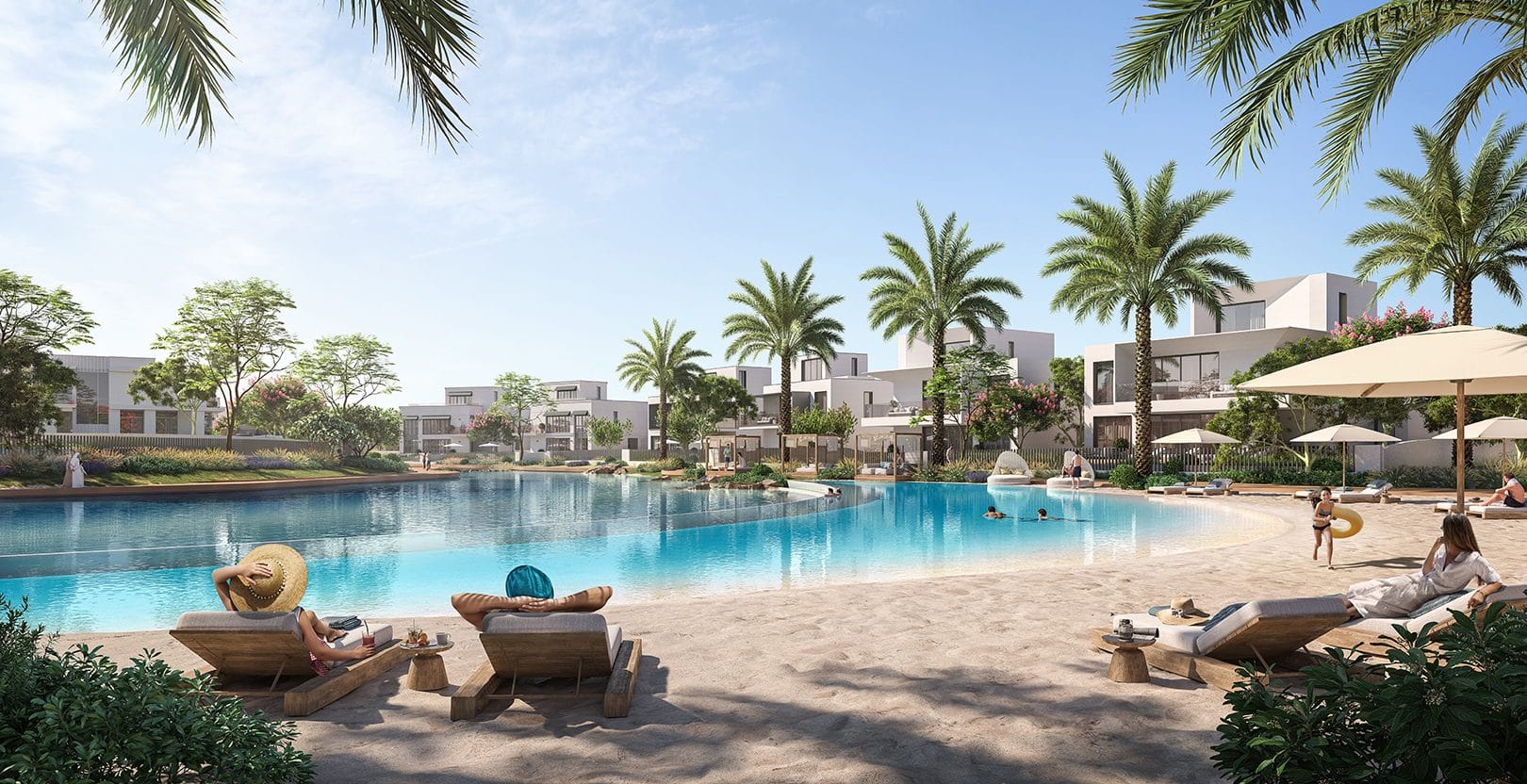 The Oasis community lagoon and beach beside villas — official rendering