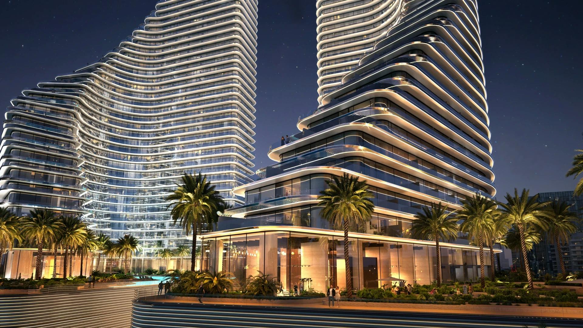 Binghatti Flare: Flare towers and landscaped entrance at night; official developer rendering