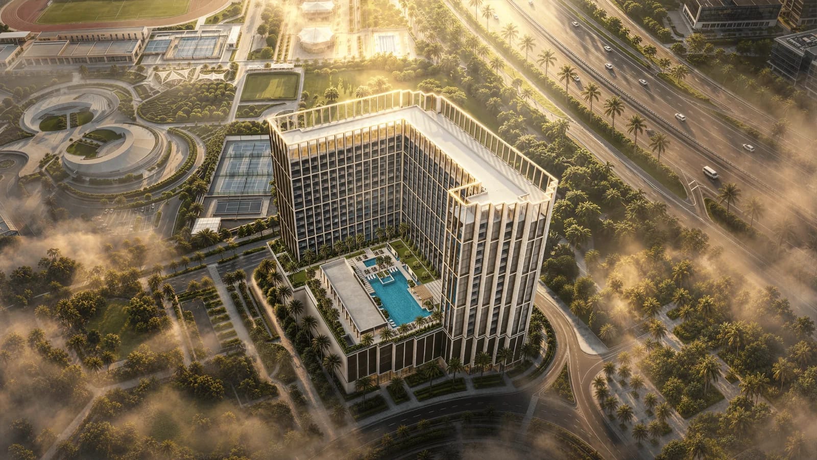 Binghatti Starfall: Aerial view of the building and pool courtyard (developer rendering)
