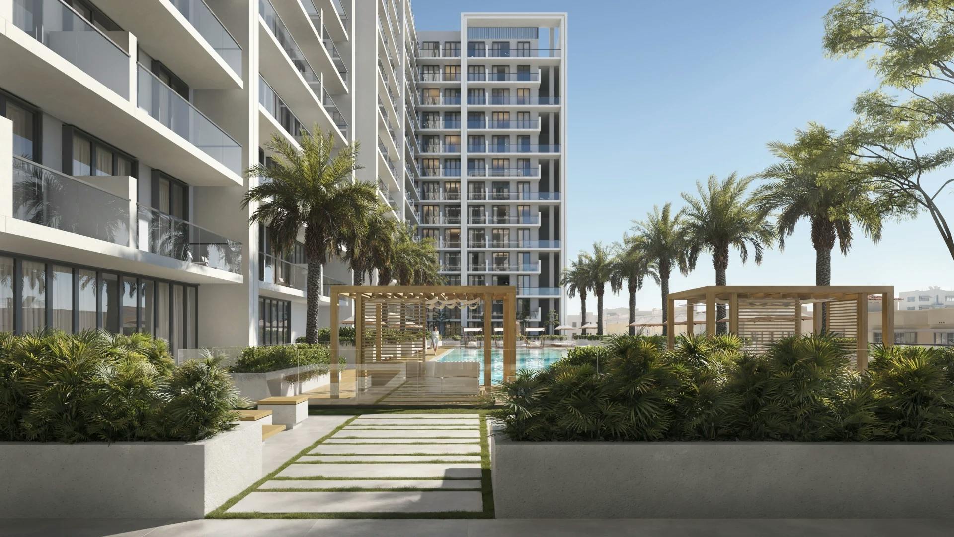 Binghatti Amberhall: Landscaped courtyard walkway (developer rendering)