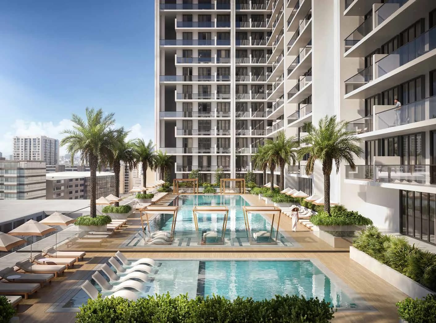 Binghatti Amberhall: Shared swimming pools and pool deck (developer rendering)
