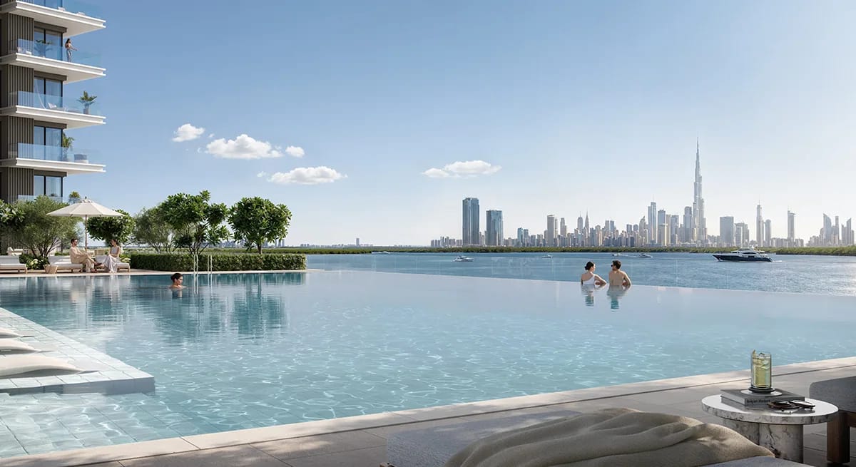 Creek Bay: infinity-edge pool facing the dubai skyline (developer rendering)