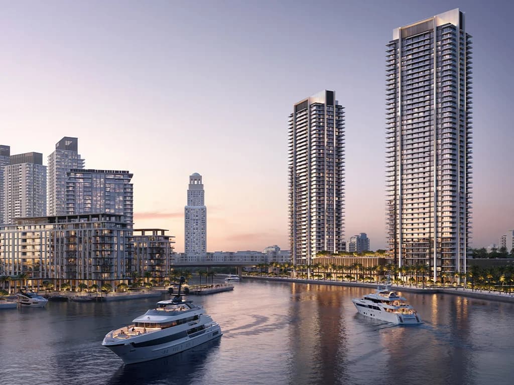 Creek Bay: waterfront towers and yacht berths at sunset (developer rendering)