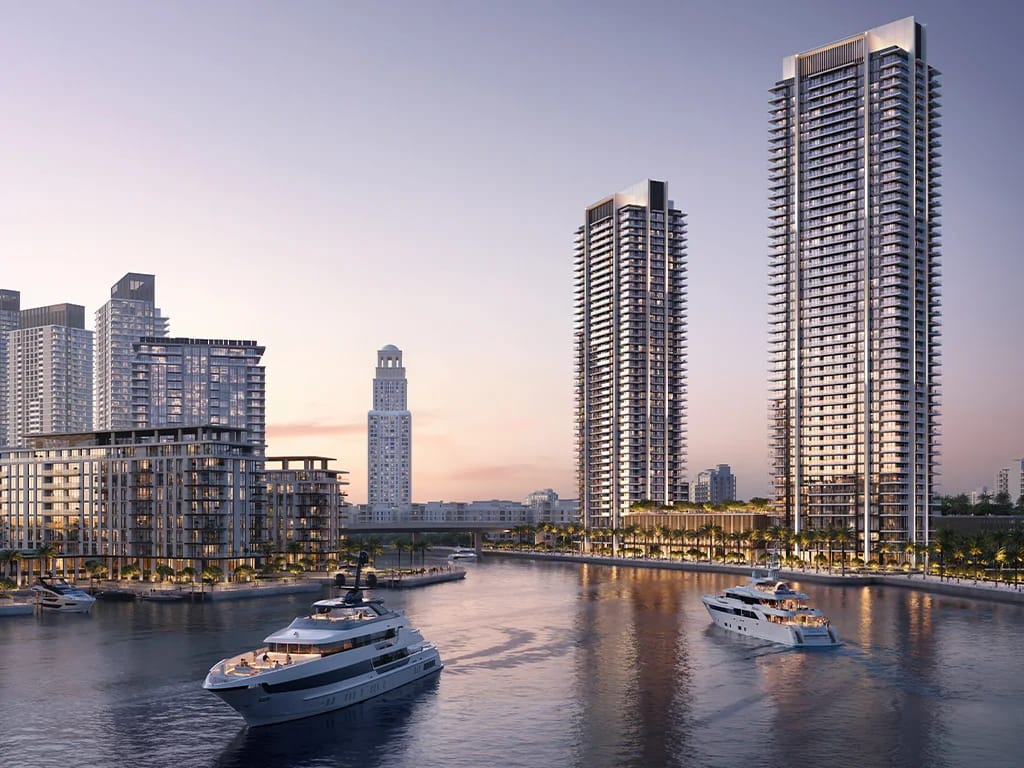 Creek Bay: waterfront towers and yacht berths at sunset (developer rendering)