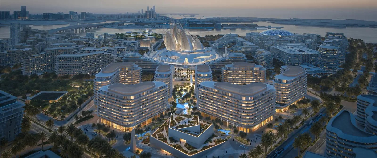 The Row Saadiyat: aerial dusk overview of the residential quarter, developer rendering