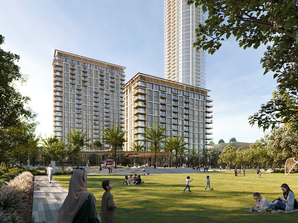 Aeon: residential towers beside landscaped community grounds, Emaar developer rendering. Illustrative property context for this guide.