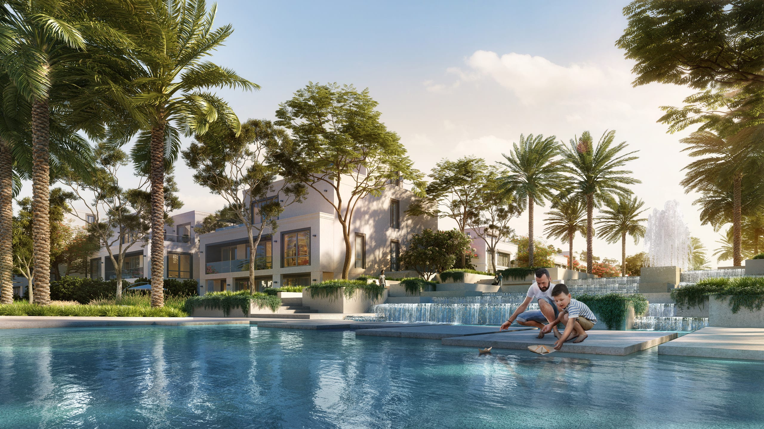 The Oasis: landscaped lagoon beside villas and palm trees, Emaar developer rendering