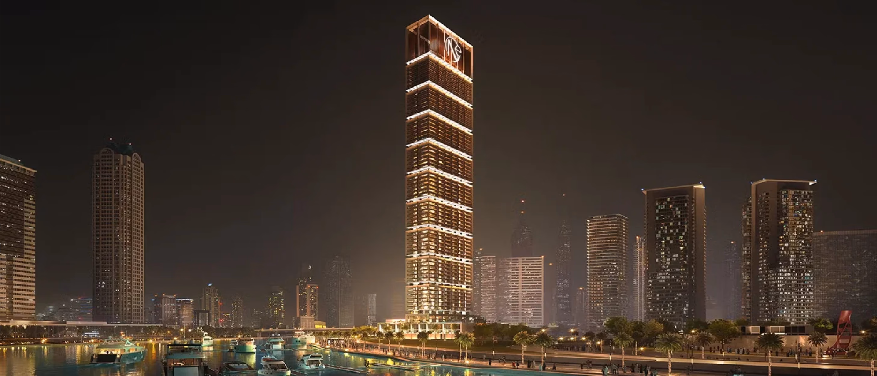 ONE by Binghatti: illuminated residential tower at night, rendering
