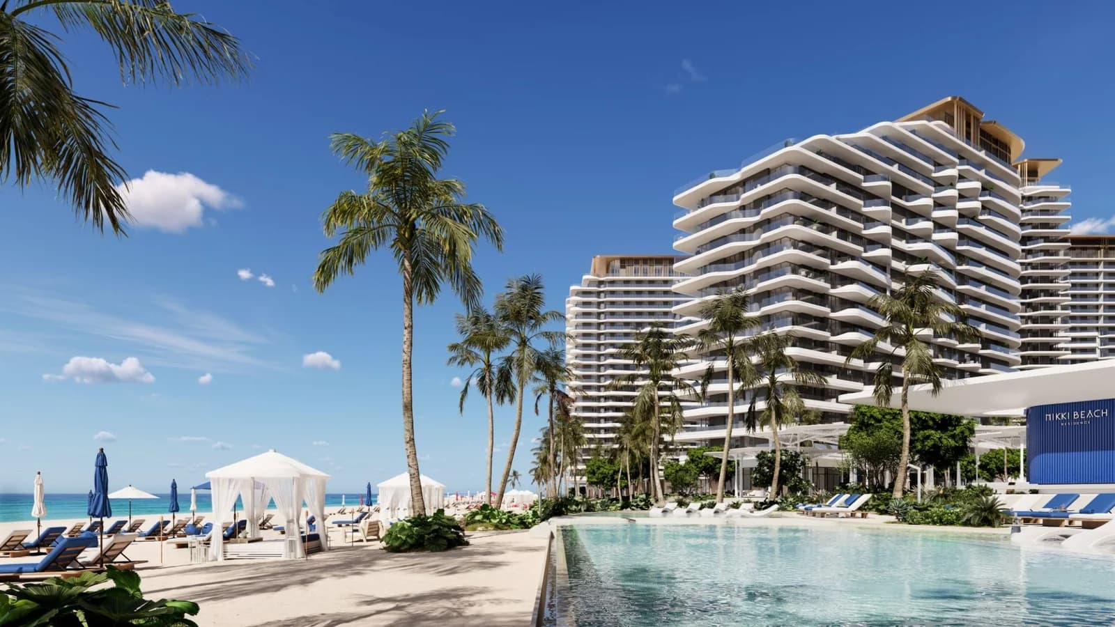 Nikki Beach Residences: buildings and resort pool beside the beach, developer rendering
